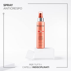 KÉRASTASE Discipline Fluidissime hands applying the mist for smooth, manageable hair.