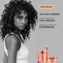 KÉRASTASE Discipline Fluidissime heat protection up to 450°F for styling.