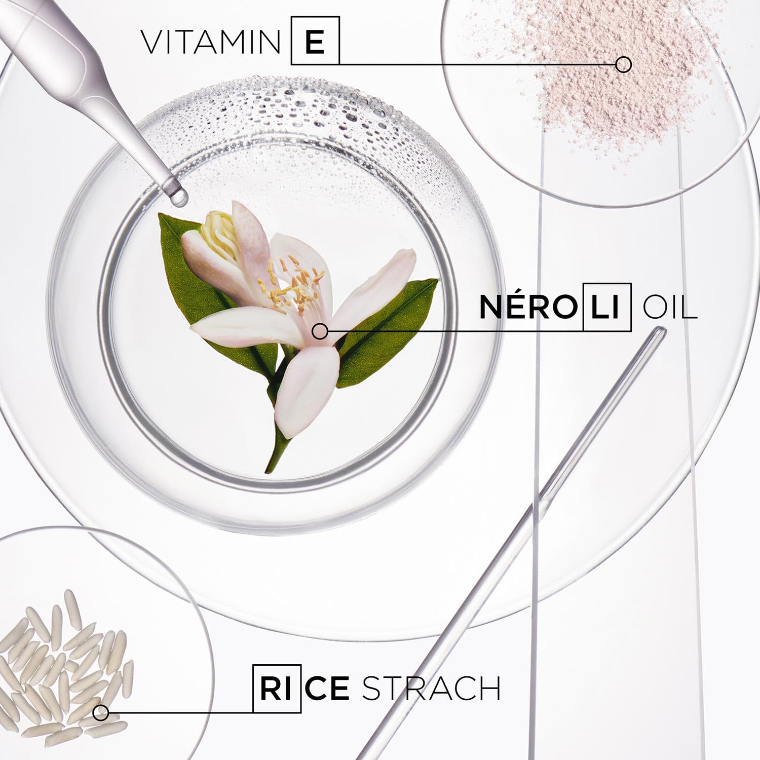 KÉRASTASE Fresh Affair close-up on nozzle showing lightweight translucent formula.