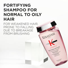 Close-up of creamy lather from Kerastase Genesis Hydra-Fortifiant Shampoo for detangling.