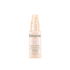Kérastase Gloss Absolu Glaze Milk bottle pours for detangling and long-hair smoothness