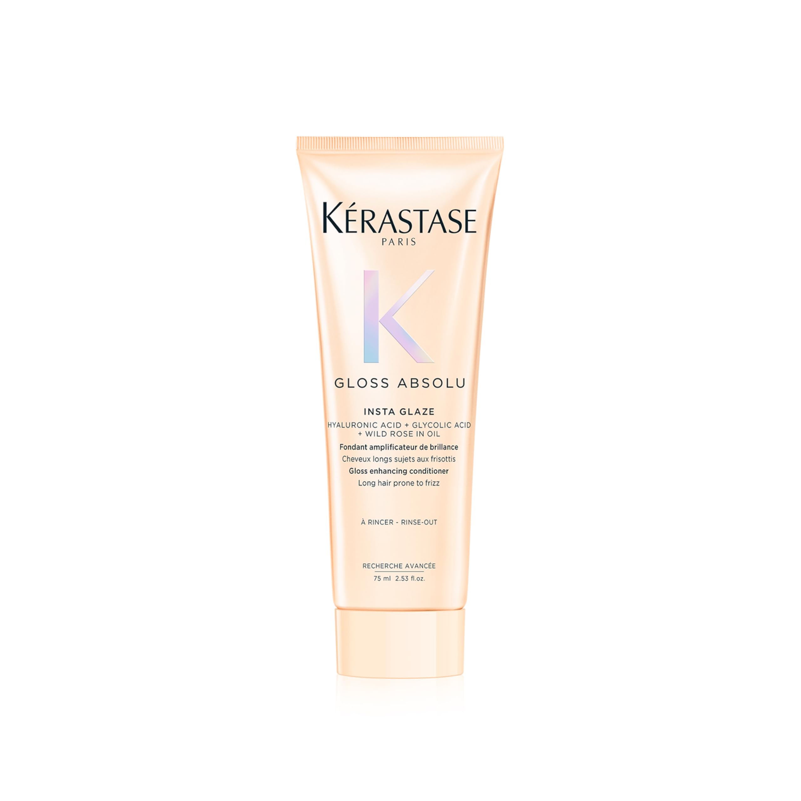 Kerastase Gloss Absolu bottle demonstrates travel-size conditioning for glossy, frizz-resistant hair.