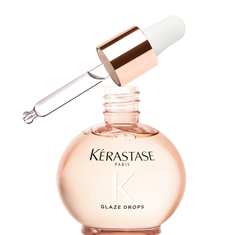 KÉRASTASE front packaging showing sleek bottle and brand benefit