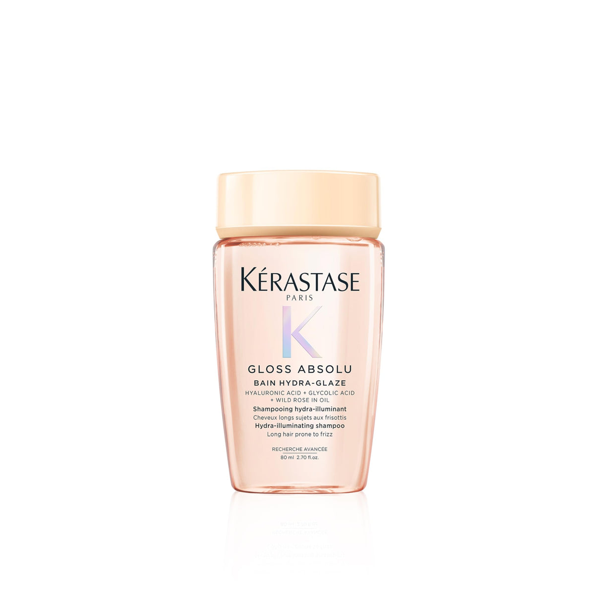 KÉRASTASE Gloss Absolu shampoo bottle close-up shows glossy shine potential.