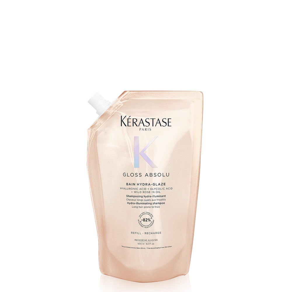 KÉRASTASE Gloss Absolu shampoo bottle closeup for glossy, frizz-controlled styling.