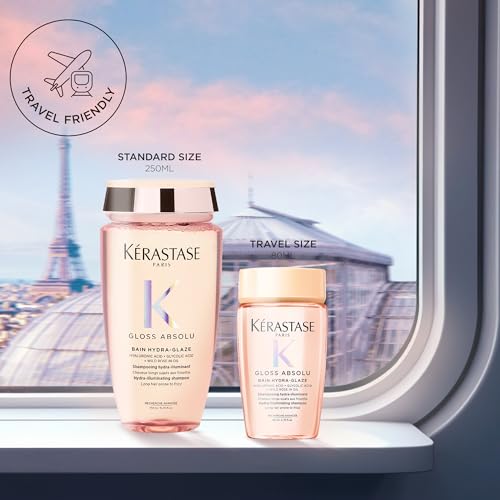 KÉRASTASE Gloss Absolu shampoo lather foaming during shower for frizz control.