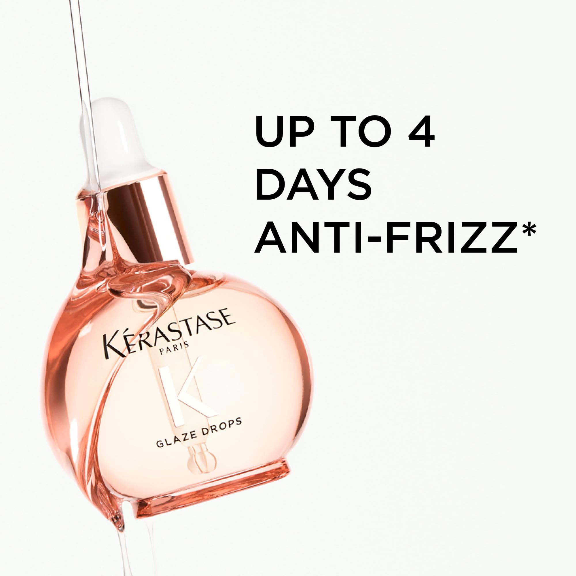 KÉRASTASE bottle next to ruler showing compact travel‑friendly benefit