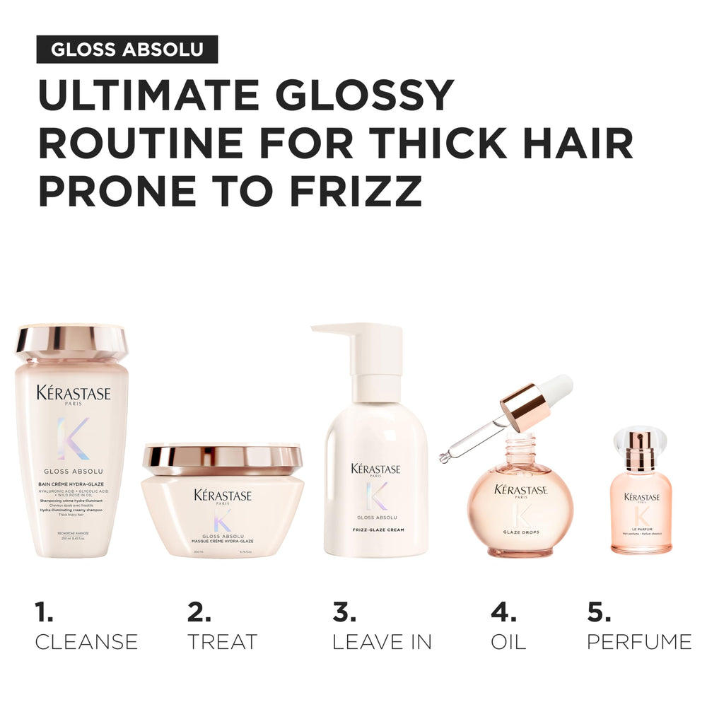 KÉRASTASE applied to styled hair in lifestyle scene, suggests mood-lifting elegance