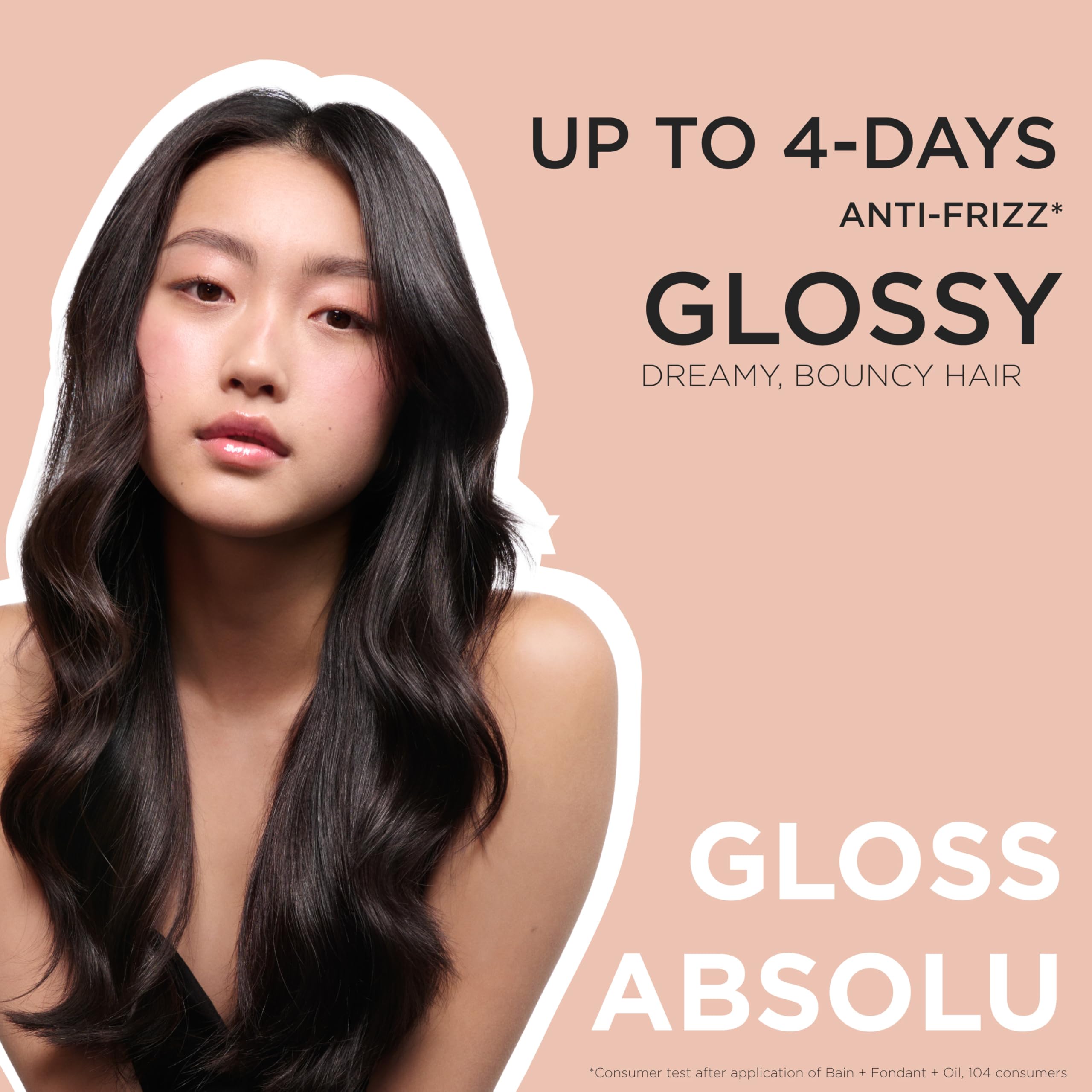 Kerastase Gloss Absolu wild rose oil detail hinting at luminous shine.