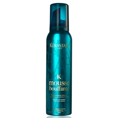 Kerastase Mousse Bouffante bottle pouring mousse delivers lightweight volume and flexible hold for fine hair.