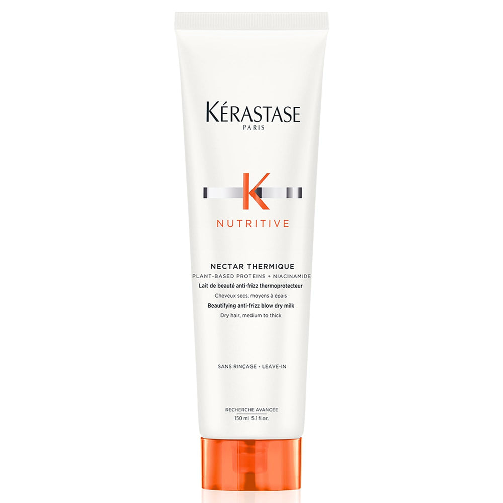 Kérastase Nectar Thermique bottle pour demonstrates heat protection for smooth styling.