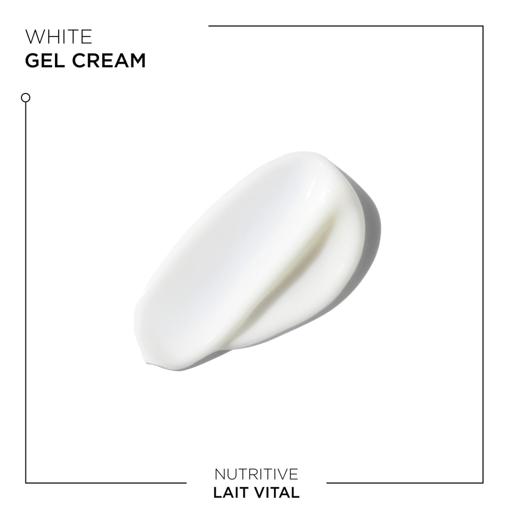 Kérastase Nutritive Lait Vital after-use smoothness — shiny, soft finish.
