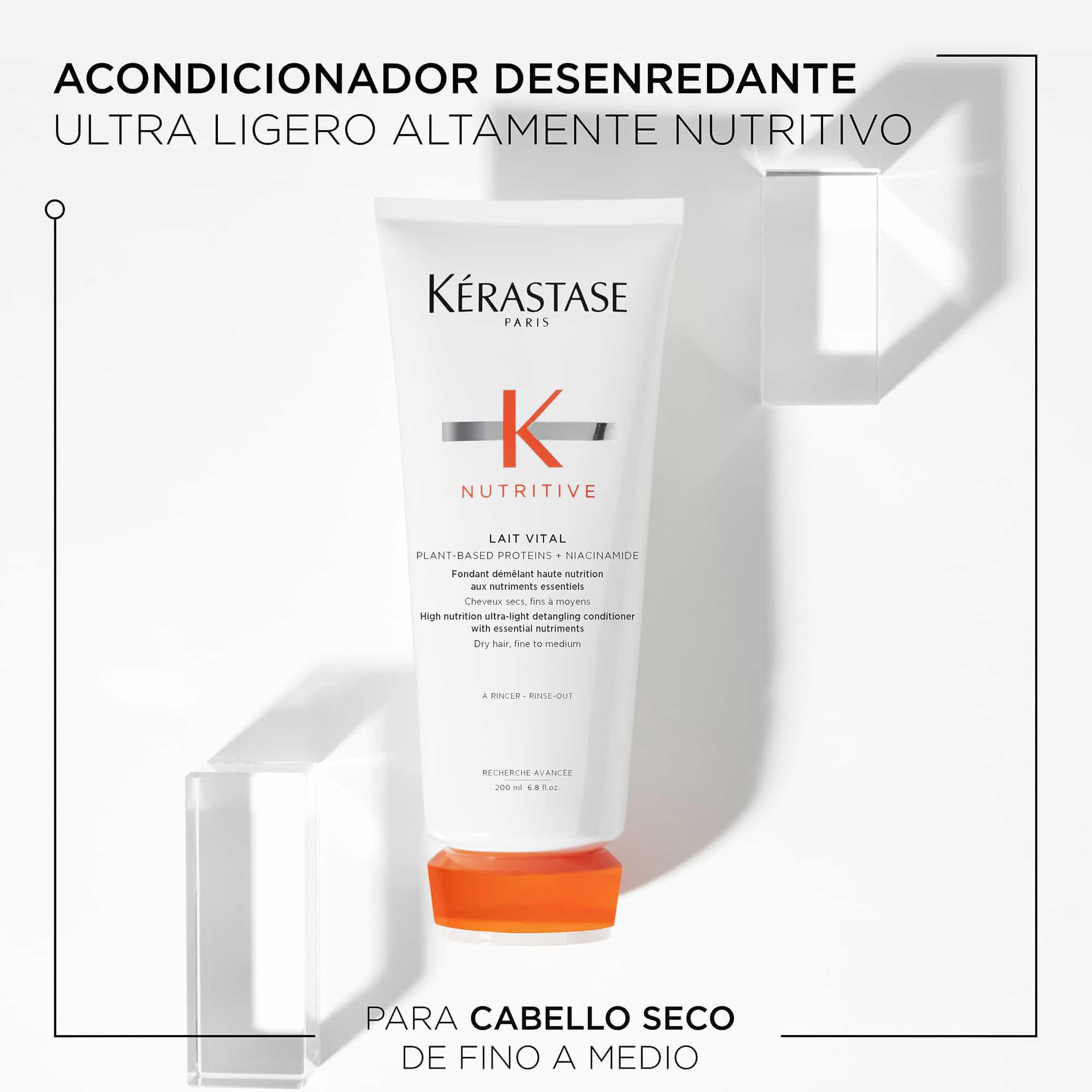Kerastase Nutritive Lait Vital being applied to mid-lengths for even hydration.