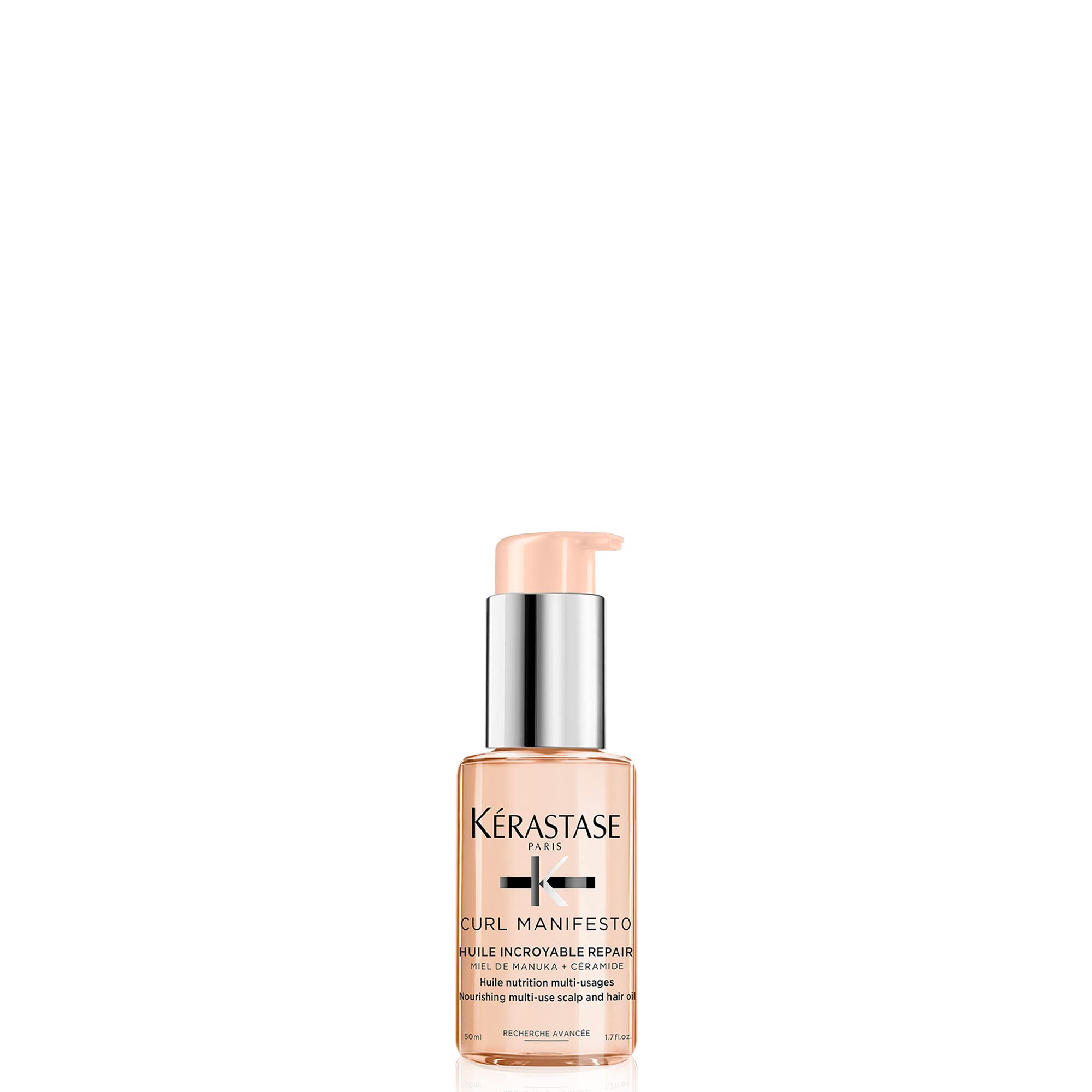 KÉRASTASE bottle front packaging showing product identity and compact travel size