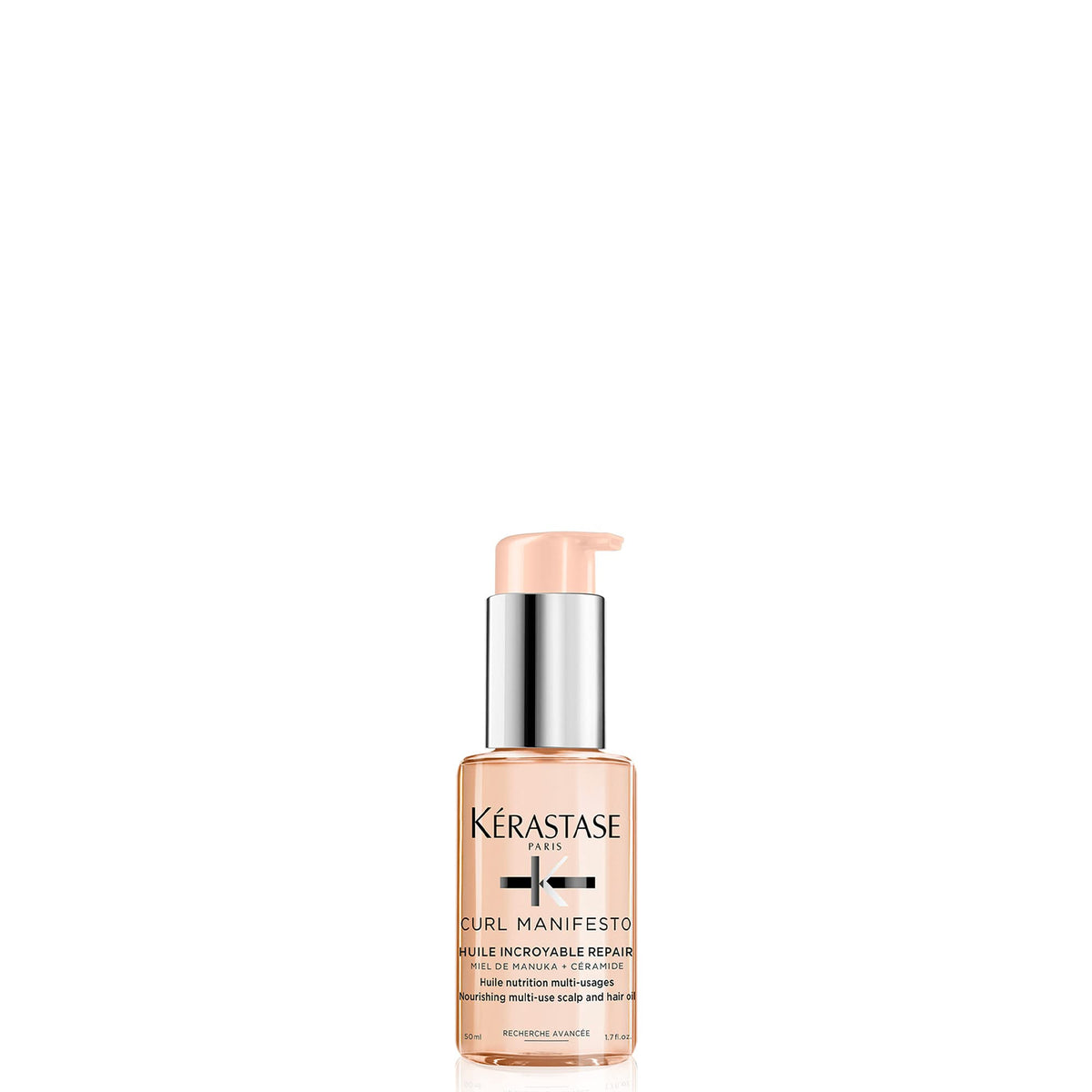 KÉRASTASE bottle front packaging showing product identity and compact travel size
