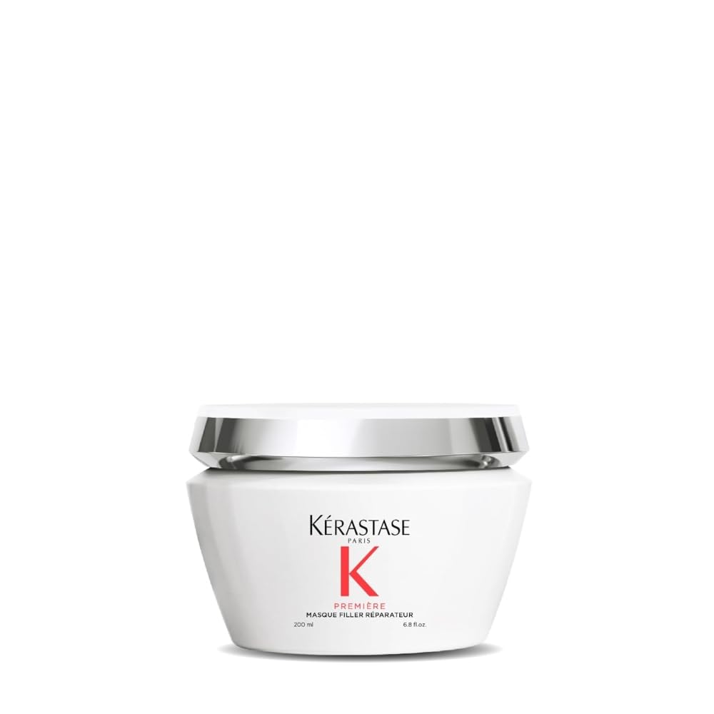 KÉRASTASE Premiere anti-breakage mask bottle on vanity for smoother, shinier hair.