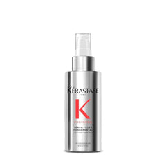 Kerastase Premiere anti-frizz serum bottle shows heat protection and frizz control in action