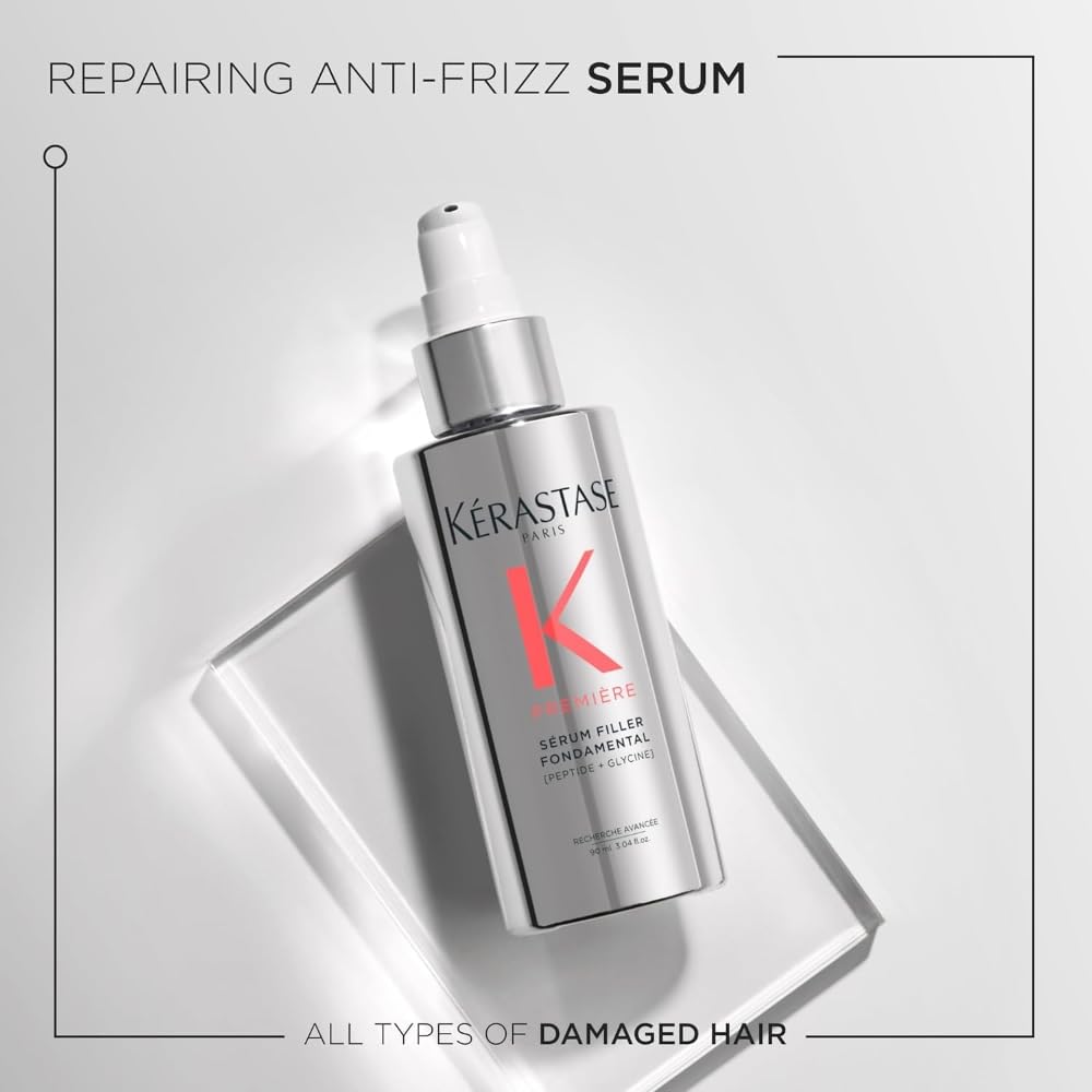 Kerastase Premiere anti-frizz serum pump closeup ready for even application and shine