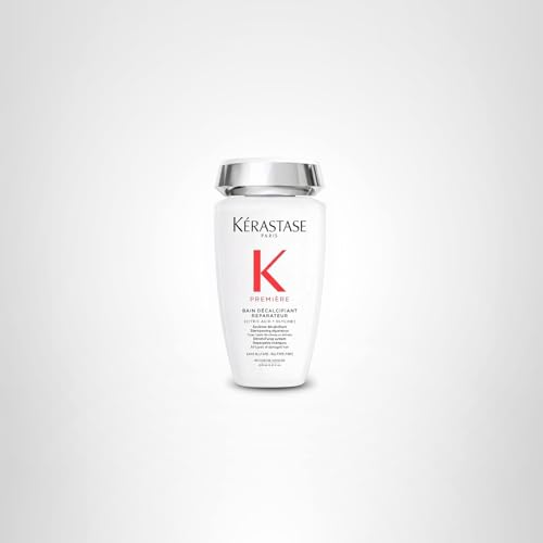 Luxury bathroom setup with Kerastase Premiere lineup signaling premium care.