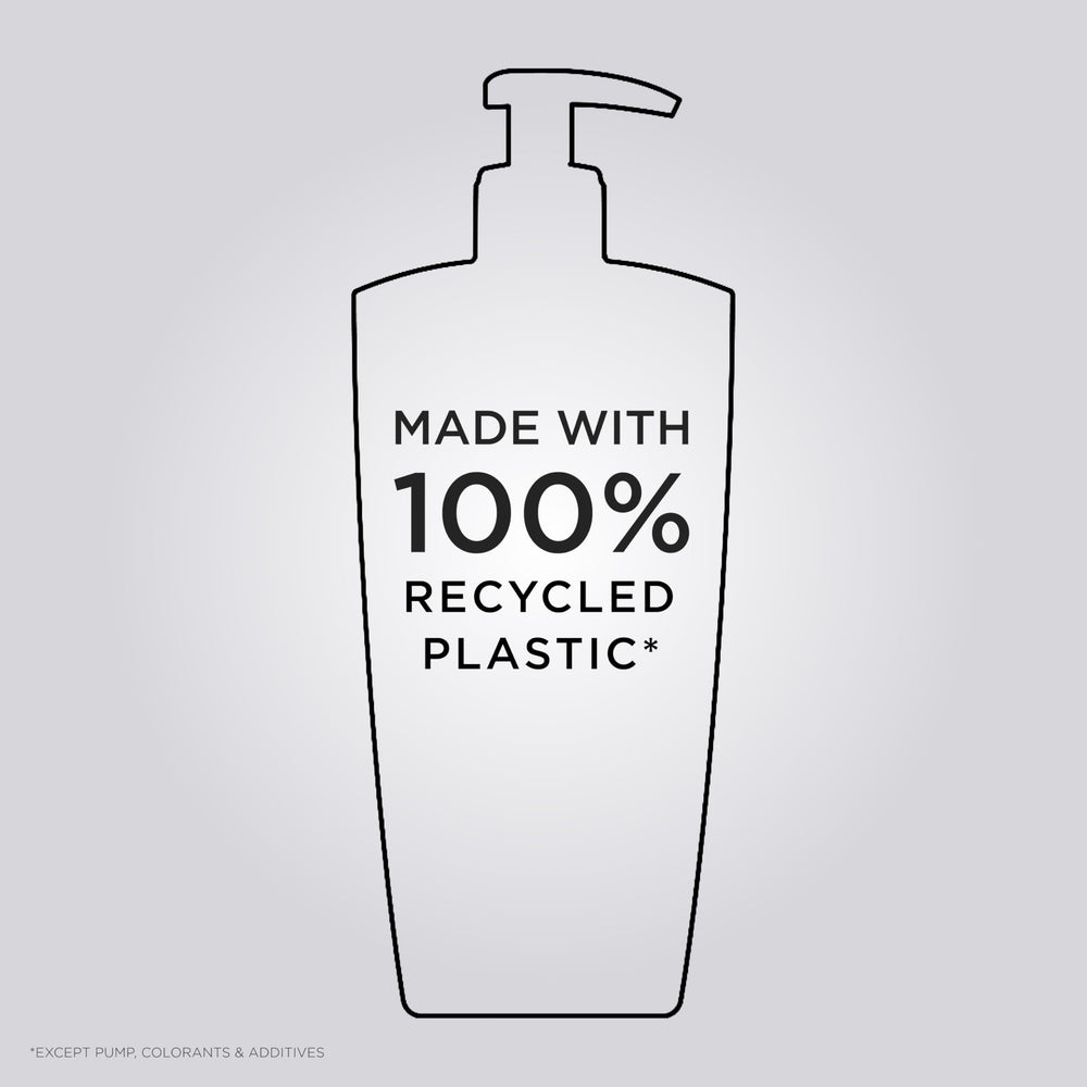 KÉRASTASE shampoo on shelf in bathroom conveying salon-quality care
