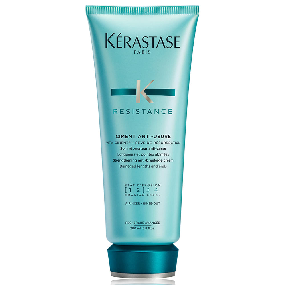 KÉRASTASE Resistance Ciment Anti-Usure packaging signals premium restorative care for damaged hair.