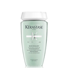 KÉRASTASE Specifique Balancing Shampoo bottle pour shows oil-control action for refreshed scalp.