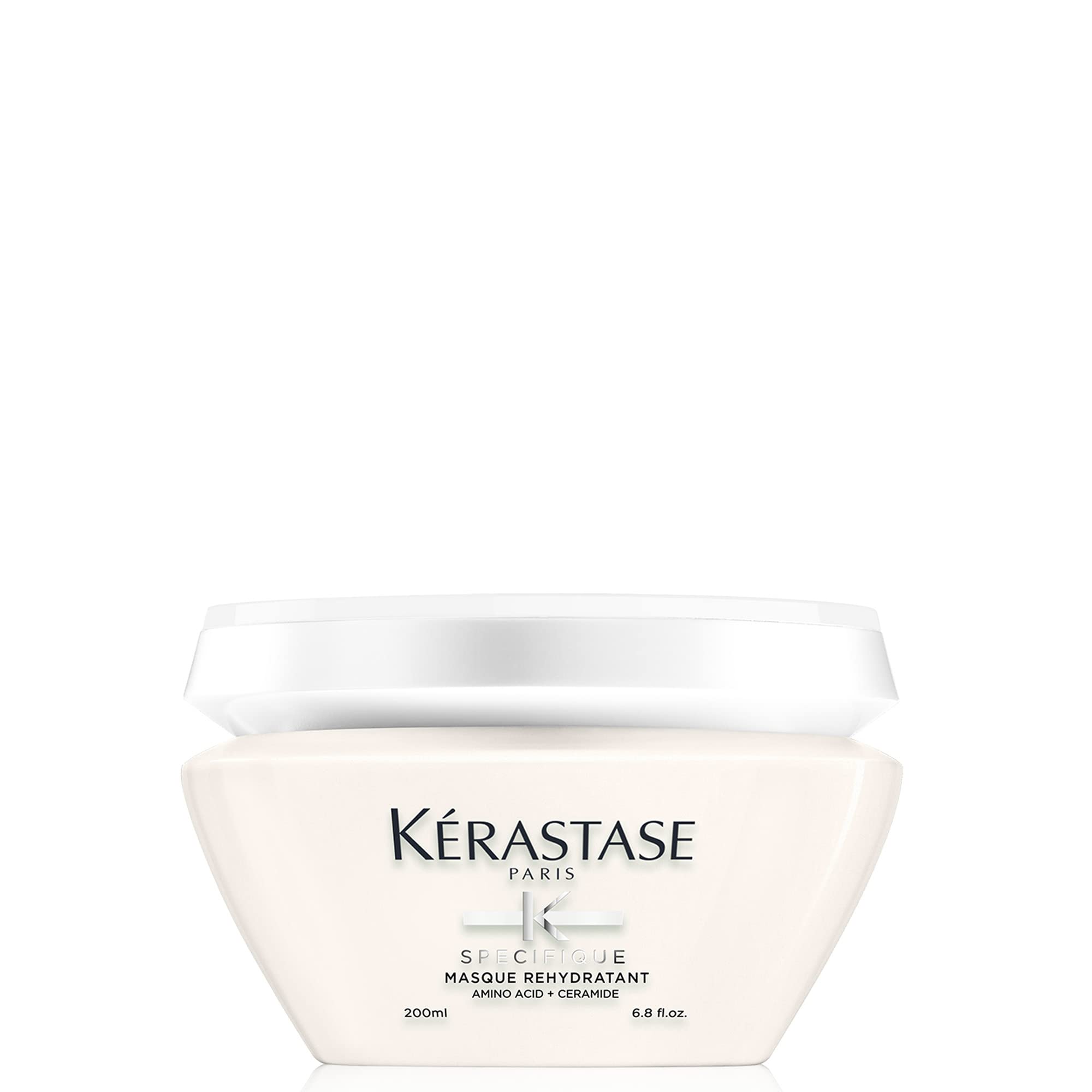 KÉRASTASE Specifique Rehydratant bottle shows weightless hydration for dry hair.