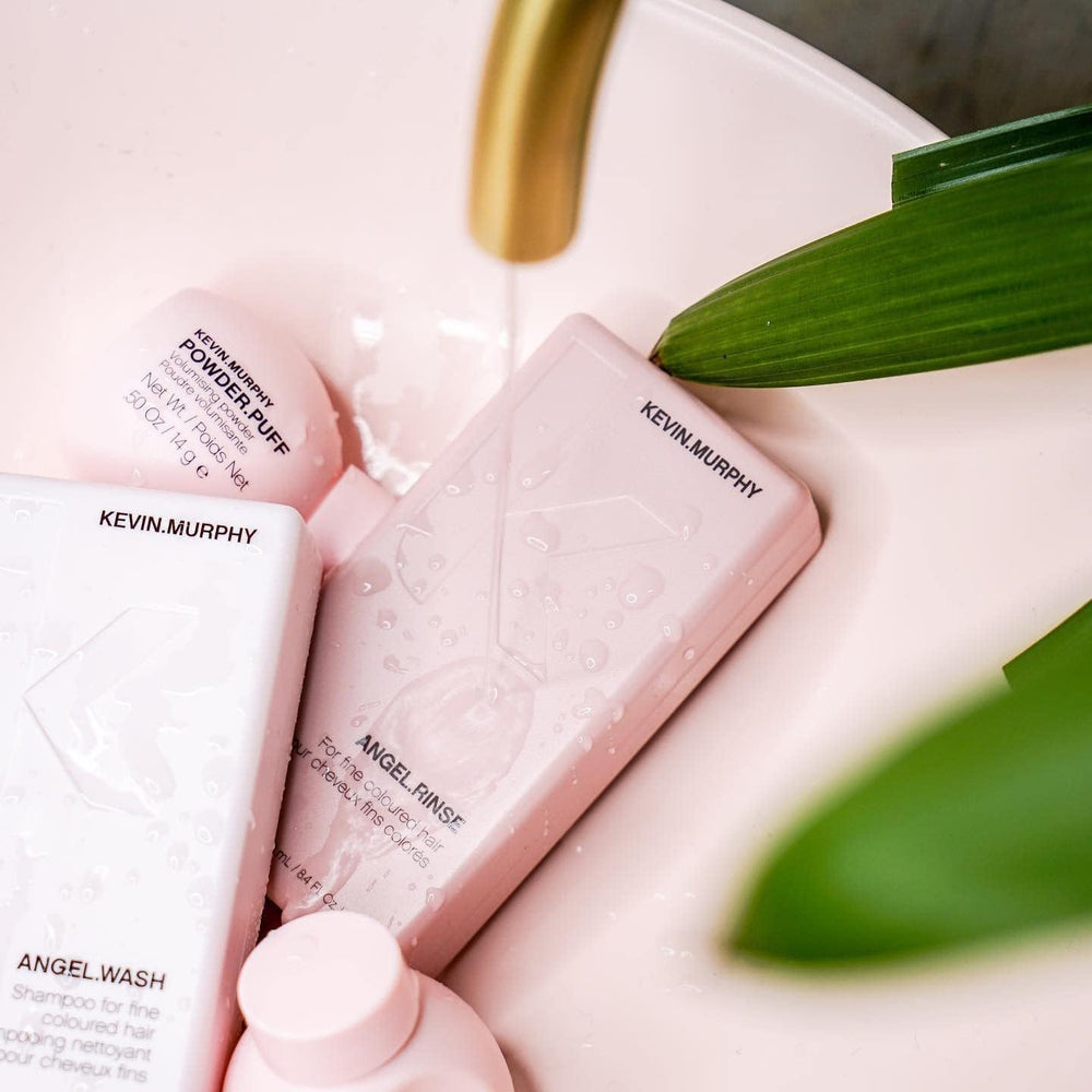 Kevin Murphy Angel Rinse bottle front highlighting detangling and color-friendly conditioning.
