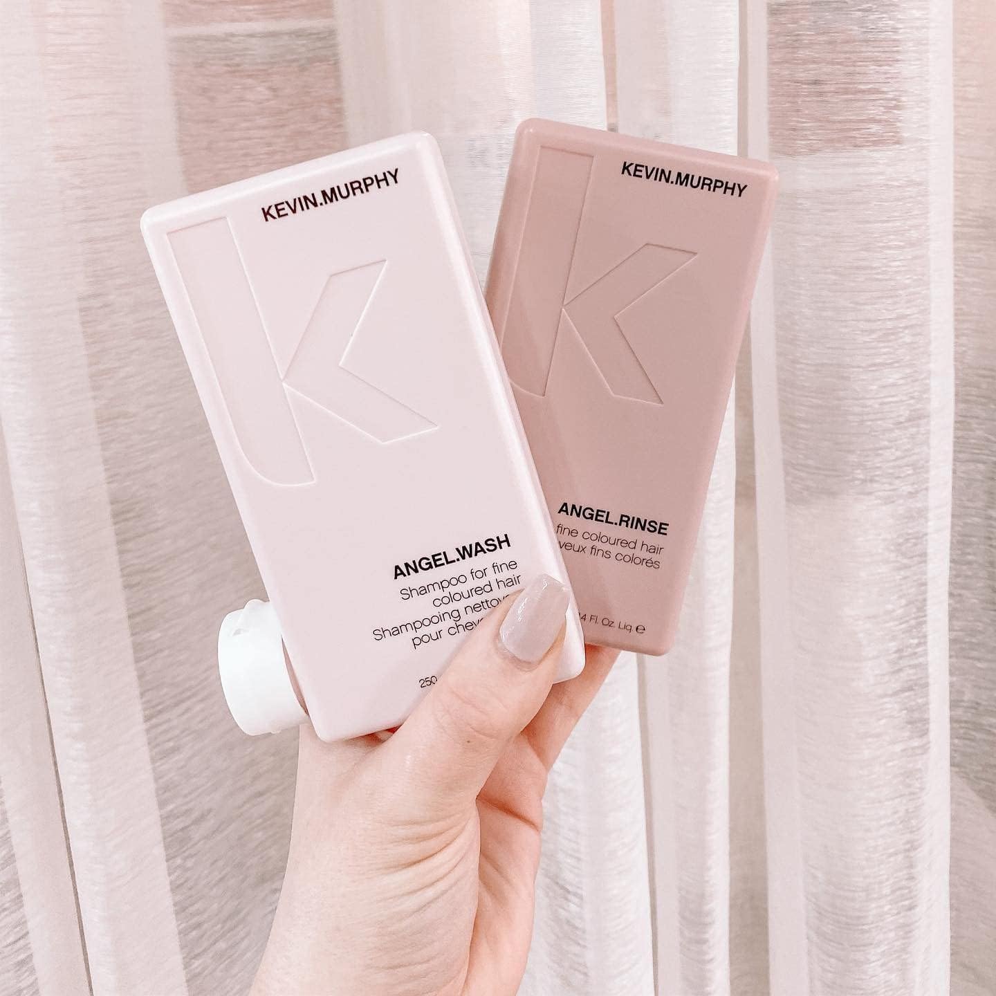 Kevin Murphy Angel Wash bottle front showing lightweight cleansing for fine hair.