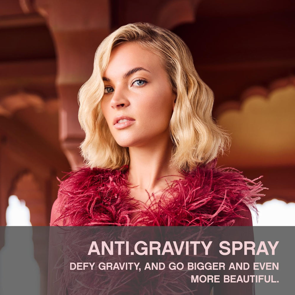 KEVIN.MURPHY ANTI.GRAVITY.SPRAY application on hair demonstrating volumizing lift.
