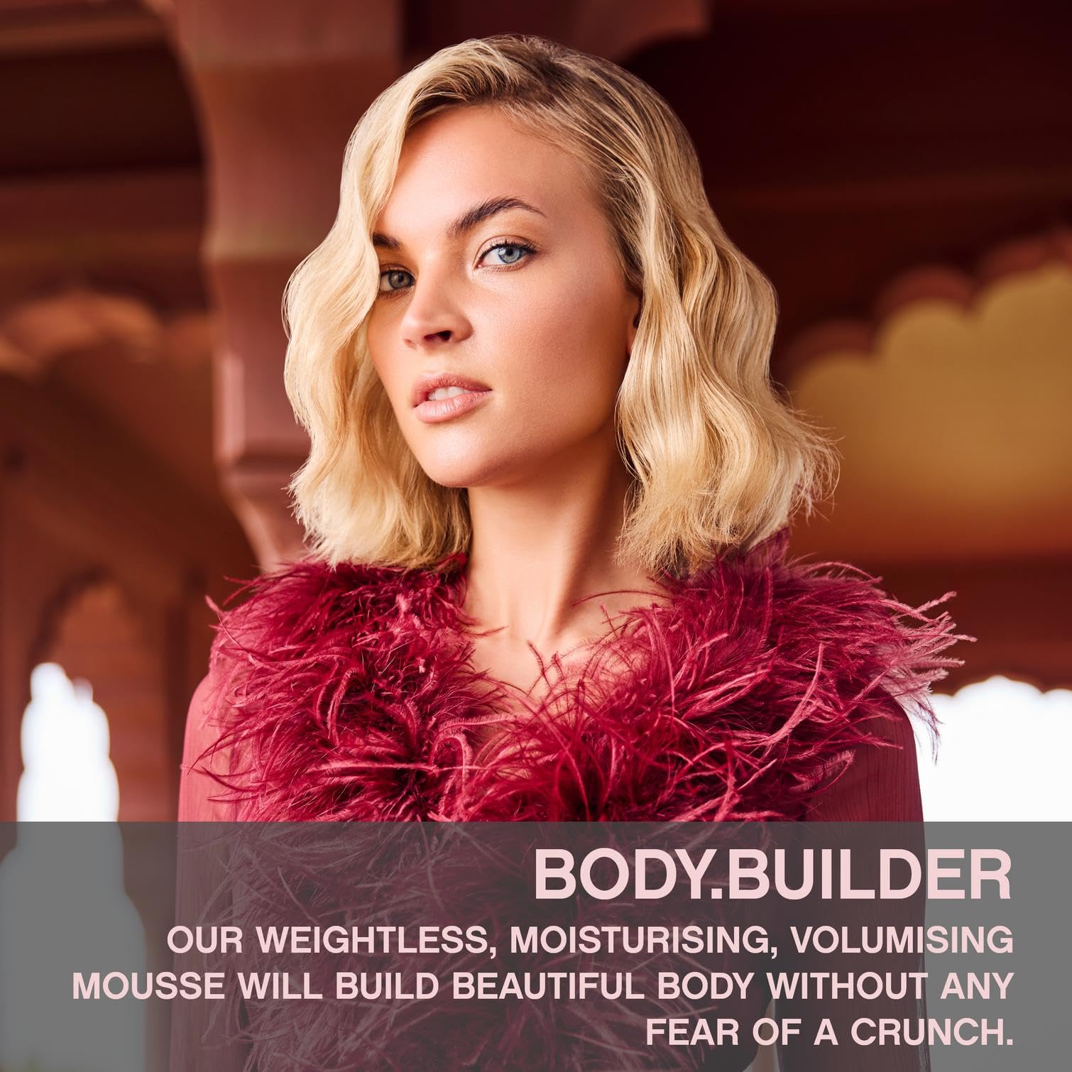 KEVIN.MURPHY BODY.BUILDER mousse dispense demonstrates easy application for buildable body without crunch.