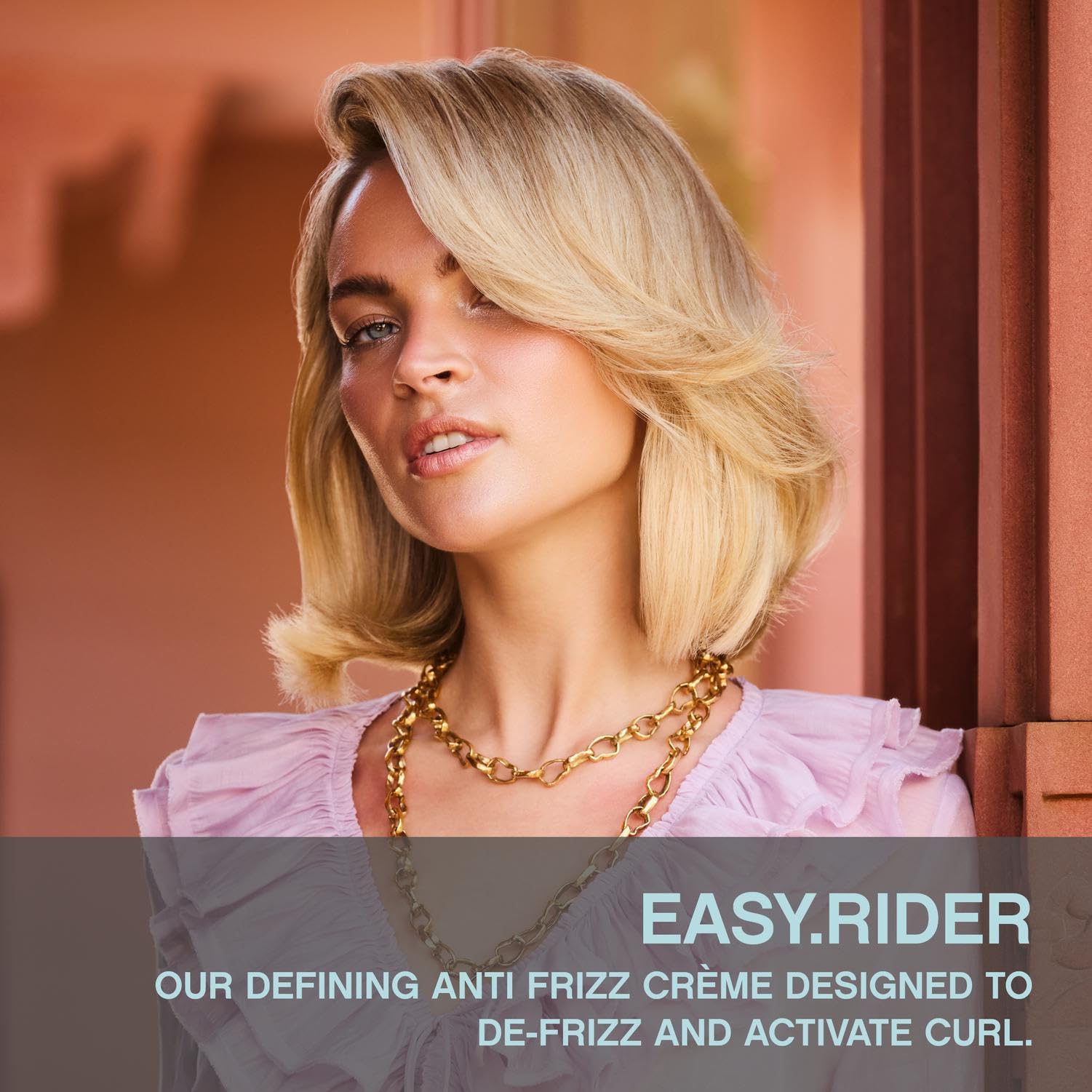 KEVIN.MURPHY EASY.RIDER application on damp hair activates curls with flexible hold.