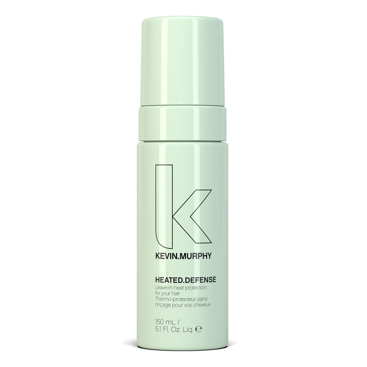 KEVIN.MURPHY HEATED.DEFENSE bottle pour shows weightless heat protection for all hair types.