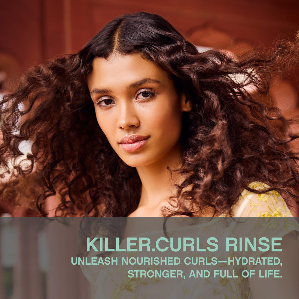 KEVIN.MURPHY Killer.CURLS RINSE pour demonstrates easy, controlled distribution for smoother detangling