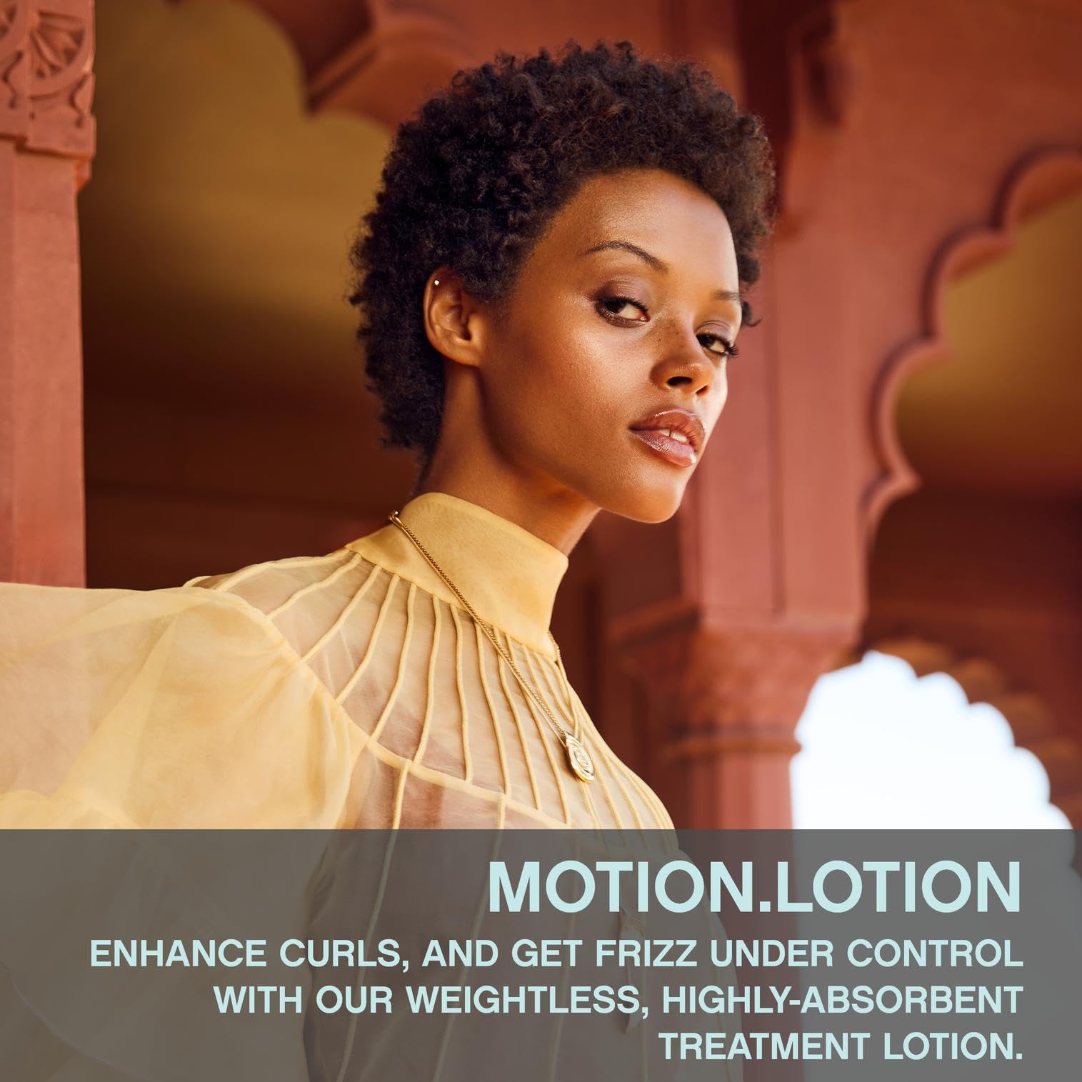 KEVIN.MURPHY MOTION.LOTION hands dispensing, showcasing lightweight frizz control