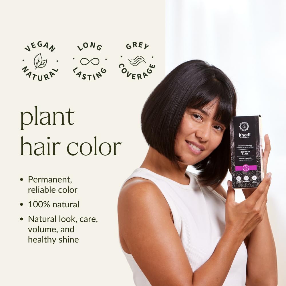 KHADI black natural hair color powder being mixed in a bowl for application