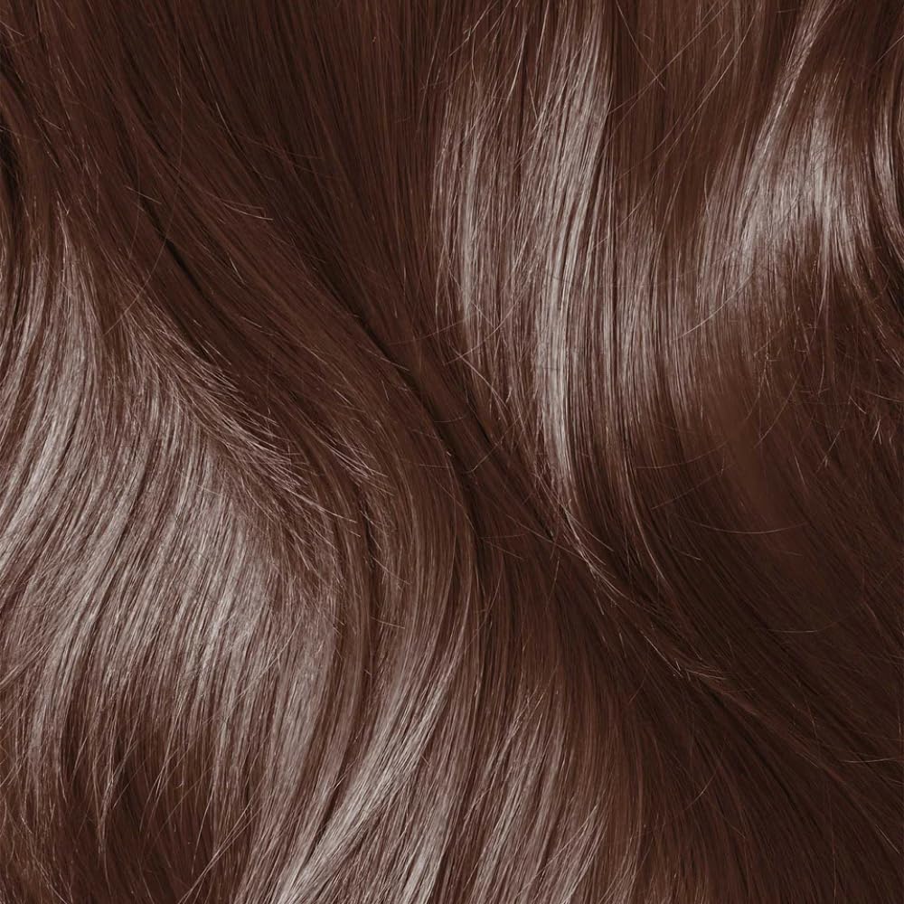 KHADI herbal powders Indigo and Henna shown highlighting plant-based pigments in action.