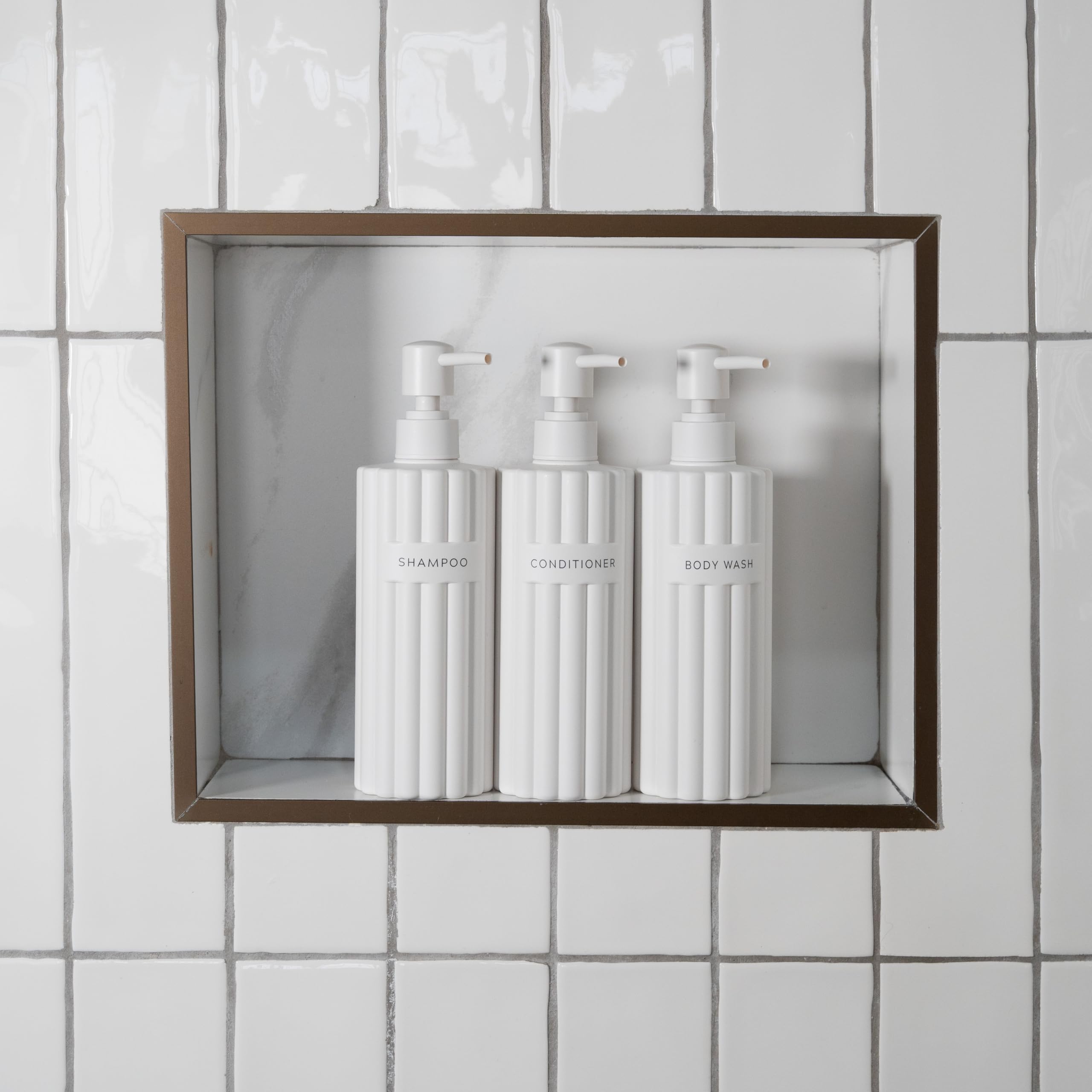 KIBAGA stylish conditioner dispenser bottle adds spa-like neatness to bathroom.