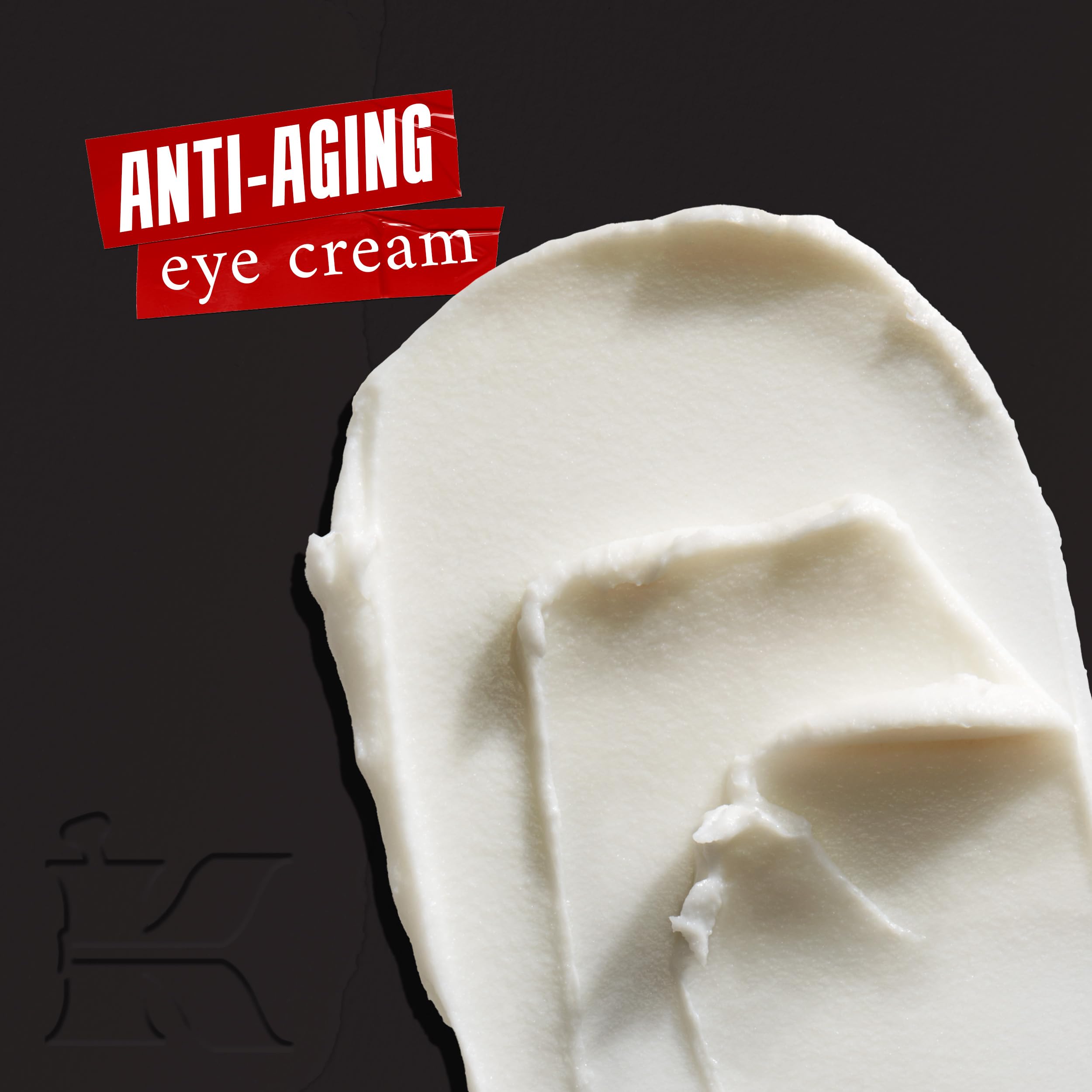 Kiehl's Age Defender Eye Repair jar closeup shows creamy texture for smoothing crow's feet.