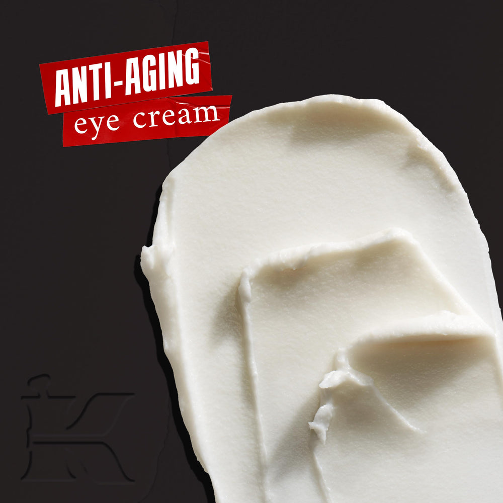 Kiehl's Age Defender Eye Repair jar closeup shows creamy texture for smoothing crow's feet.