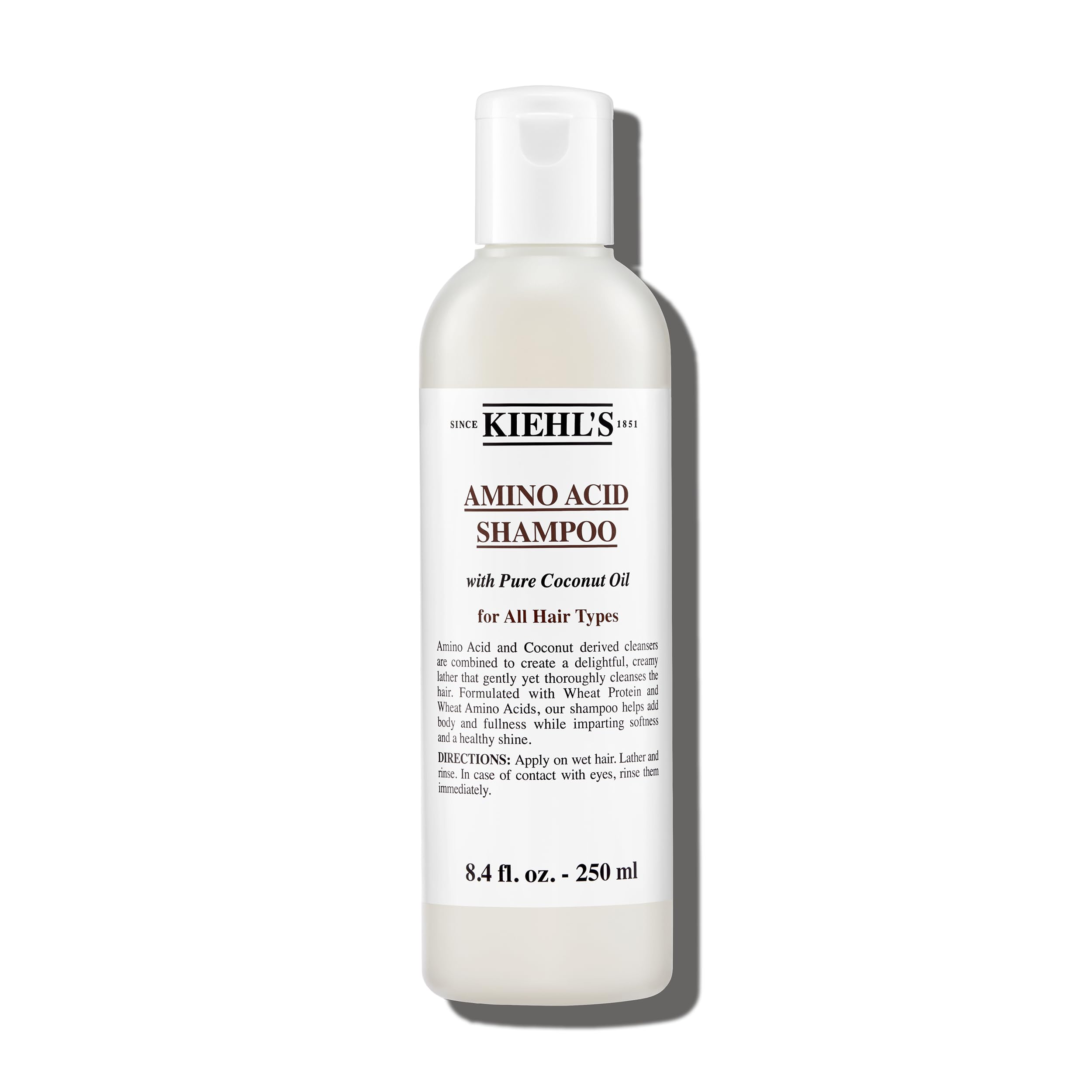 Kiehl's Amino Acid Shampoo bottle front promoting gentle cleansing.