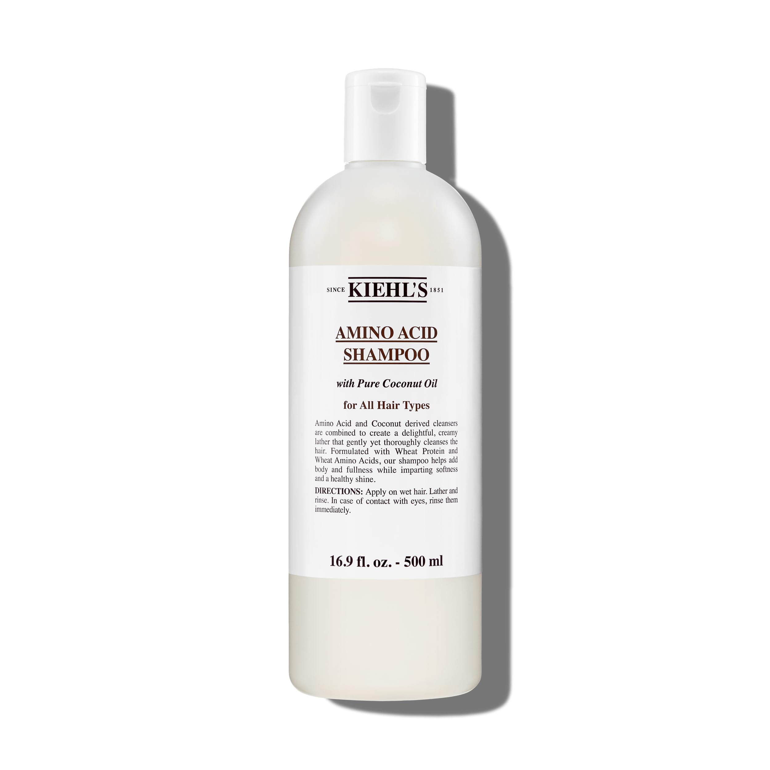 Kiehl's Amino Acid Shampoo bottle pour for daily cleansing and nourishment.