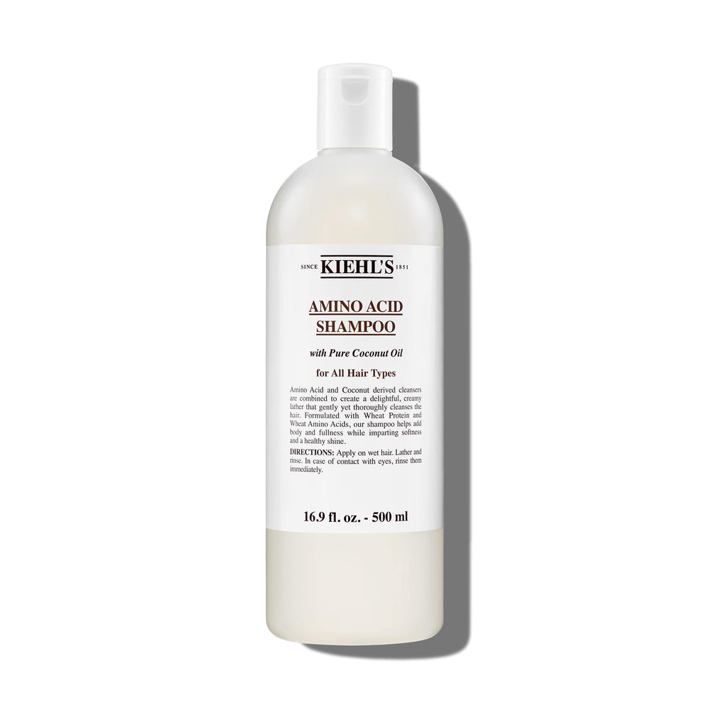 Kiehl's Amino Acid Shampoo bottle pour for daily cleansing and nourishment.