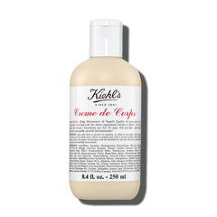Kiehl's Creme de Corps jar closeup shows rich, fast-absorbing hydration.
