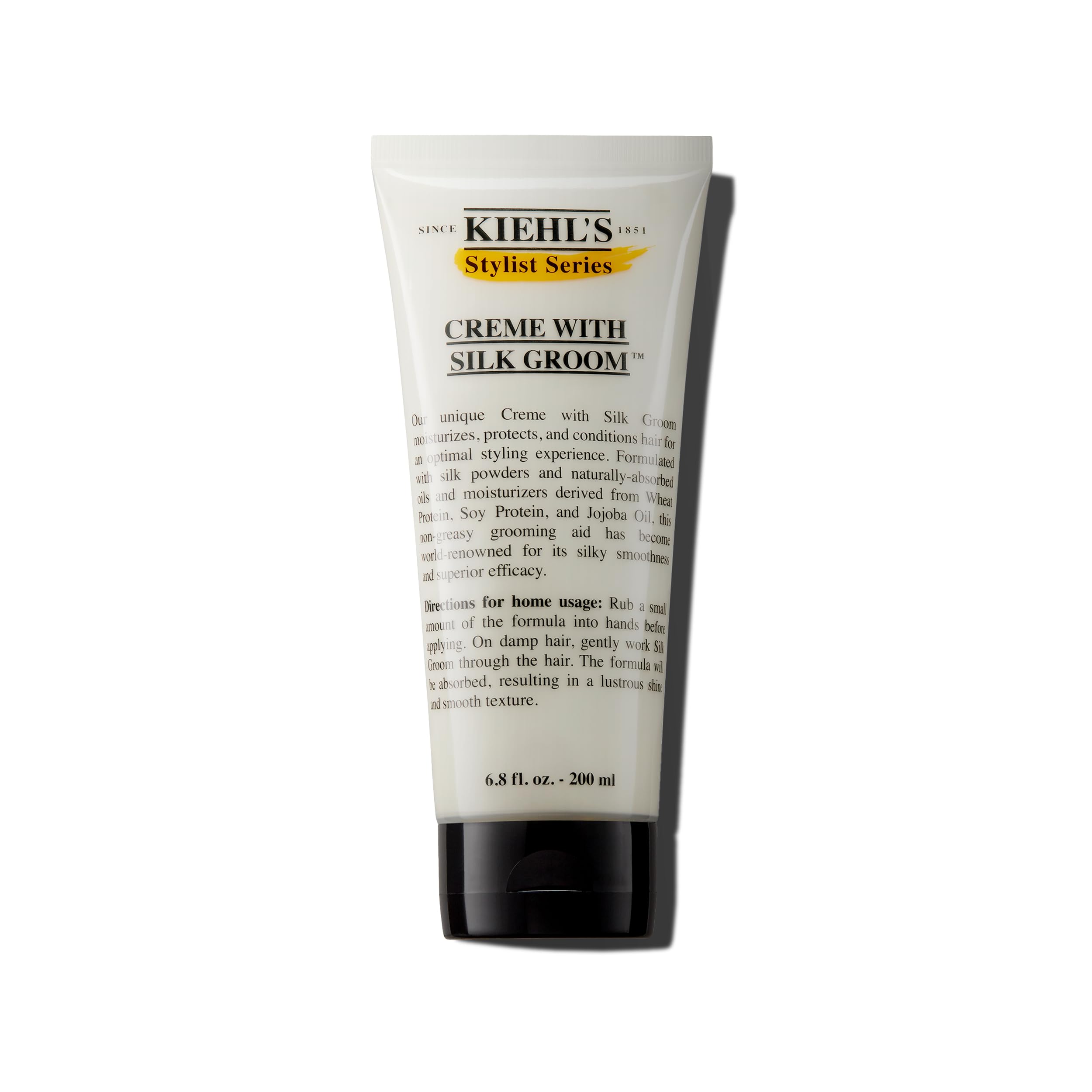 Kiehl's creme with silk groom bottle close-up highlights lustrous shine for all hair types