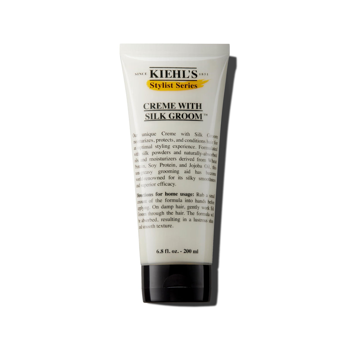 Kiehl's creme with silk groom bottle close-up highlights lustrous shine for all hair types