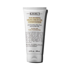 Kiehl's Nourishing Olive Fruit Oil Conditioner bottle on shelf promotes healthy-looking hair