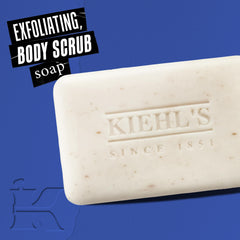 Kiehl's Ultimate Man Body Scrub bar in wet lather showing exfoliating action for tougher skin.
