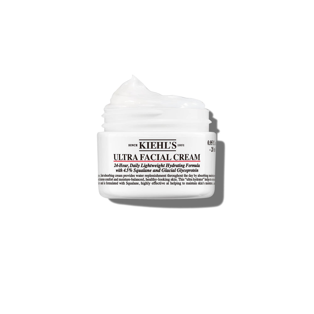 Kiehl's Ultra Facial Cream jar closeup showing creamy texture and hydration.