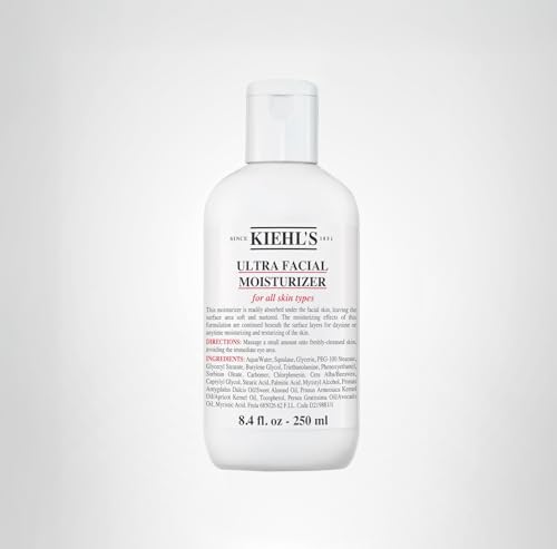 Kiehl's Ultra Facial Moisturizer on desk ready for daily hydration.